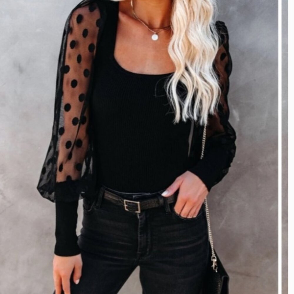 Black Blouse with fun sleeves. Size Large